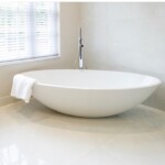 egg shaped bath with silver tap