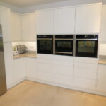 3 oven in a row in kitchen