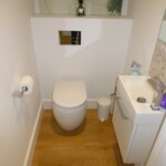 small bathroom with toilet and sink