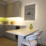 small dining table next to kitchen
