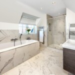 marble bathroom with silver details