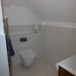 small corned bathroom