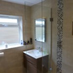 bathroom with glass shower doors