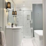 white marble bathroom with silver shower head