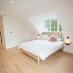 master bedroom with built in wardrobe