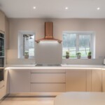 light kitchen with chrome extractor fan