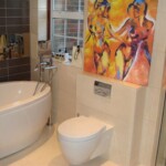 white and browned tiled bathroom