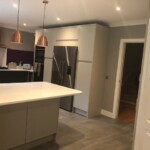 open planned white and black kitchen dinning room