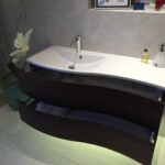 waved sink with white flower