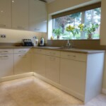 white and beige kitchen sink