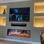 built in tv unit with shelves and lights